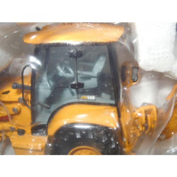 Komatsu Malta  WB146 Backhoe/Loader With Work Tools By First Gear 1/50th Scale #5 image